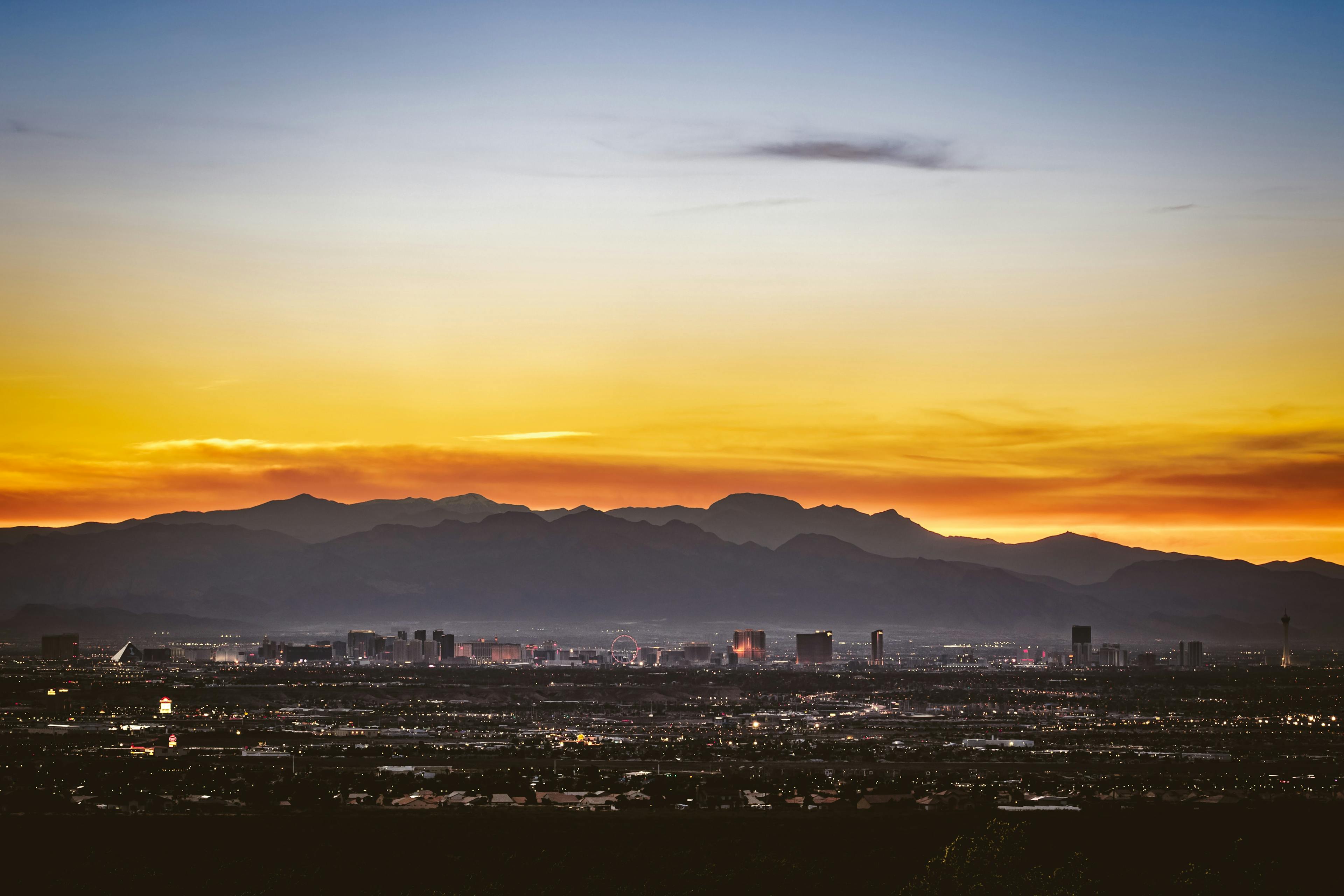 This is a view of Las Vegas with mountains behind the Las Vegas Strip. 